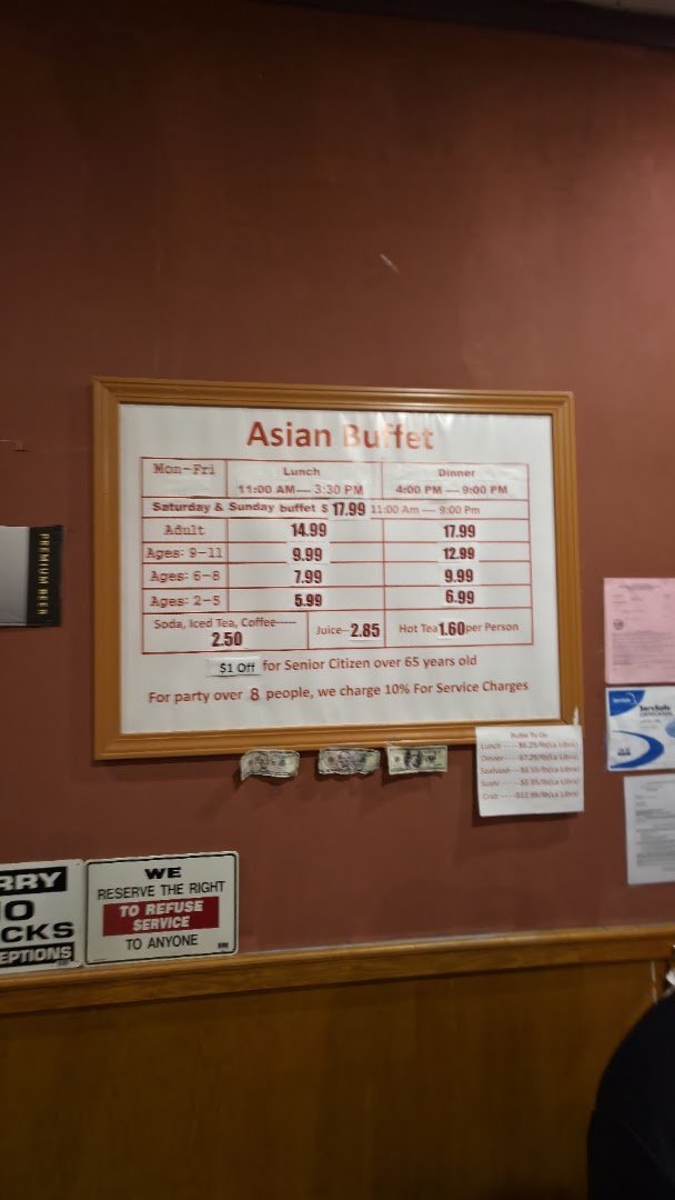 Buffet trays with mixed Asian dishes
