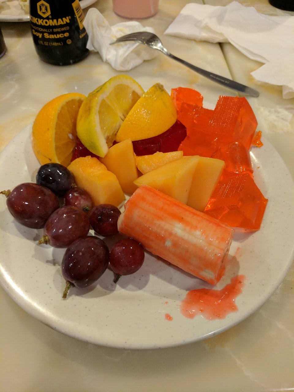 Printed menu beside buffet items