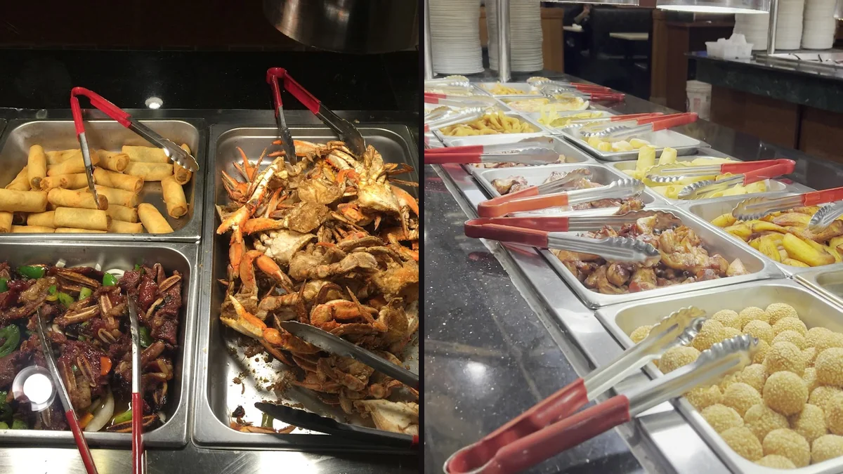 Rows of hot dishes behind glass